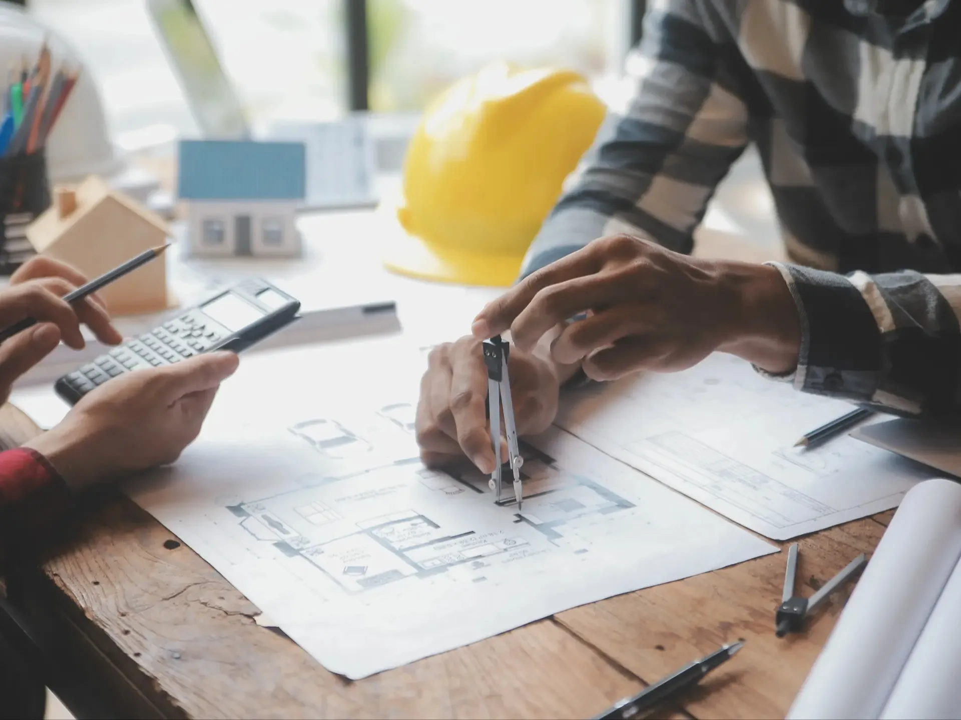 engineer-teamwork-meeting-drawing-working-blueprint-meeting-project-working-with-partner-model-building-engineering-tools-working-site-construction-structure-concept (2)